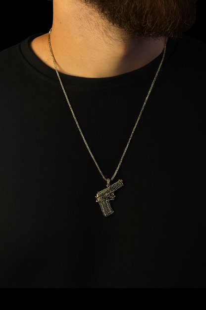 Golden Trigger cadena tejido Italiano + dije de arma en oro laminado 18K🔥