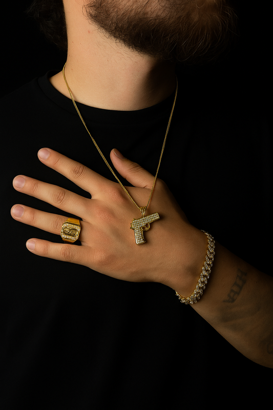 COMBO TRIGGER, CADENA PISTOLA + CUBANA CON ZIRCONIAS + ANILLO VIRGEN MARIA ORO LAMINADO 18K 🔥